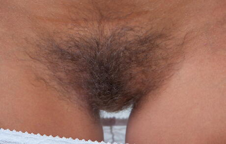 Gracile czech babe Promesita exposing tiny tits and hairy pussy 