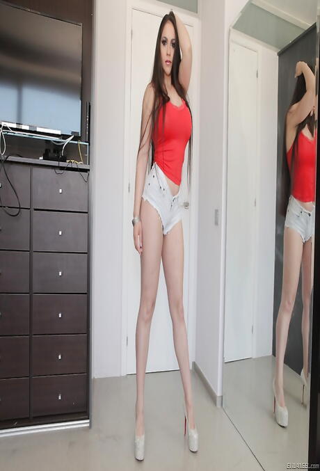 Enticing latina dark hair hottie Marta La Croft in shorts shows big tits and hot butt 